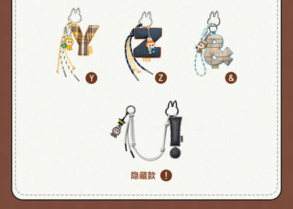 Labubu Pin for Love. Set of keychains shaped like letters Y, Z, and &, with cartoon characters on a white background.