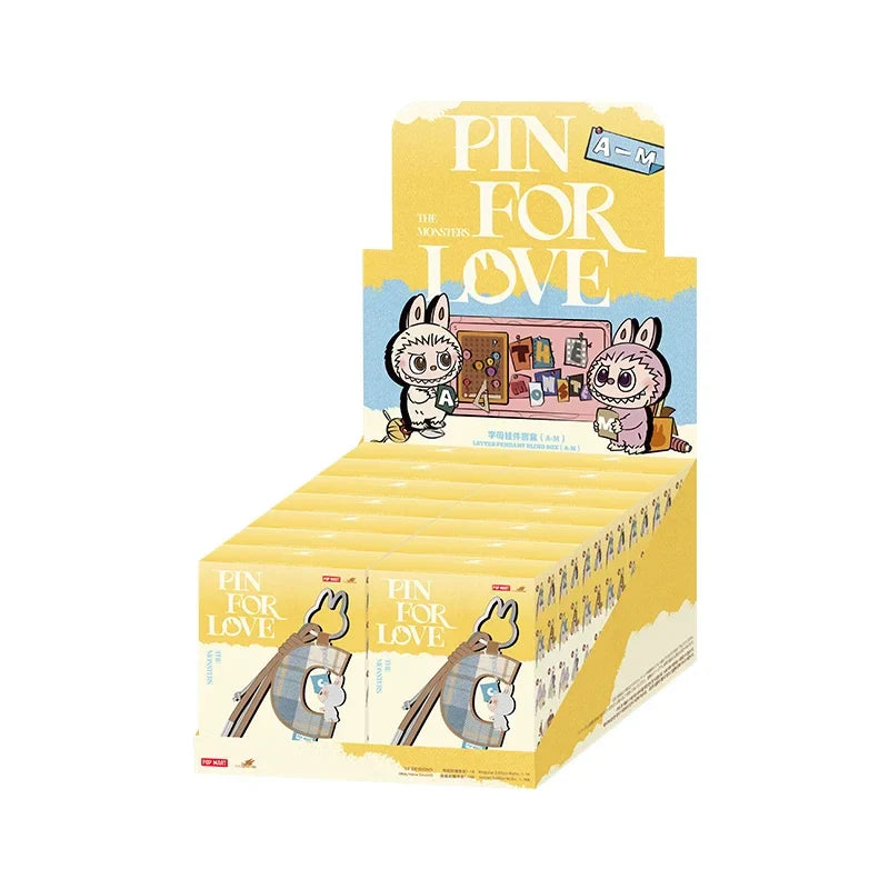 Display box of 'Pin for Love' pins with cartoon characters on a white background