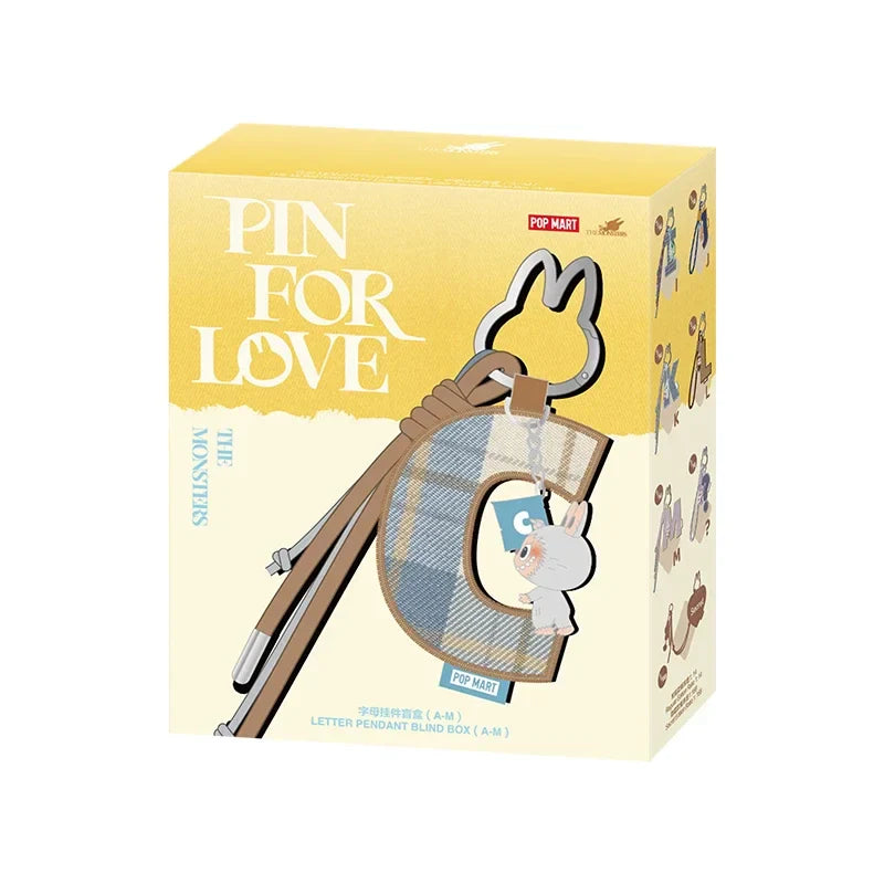 Labubu Pin for Love. Product packaging for 'Pin for Love' with a yellow and beige design.