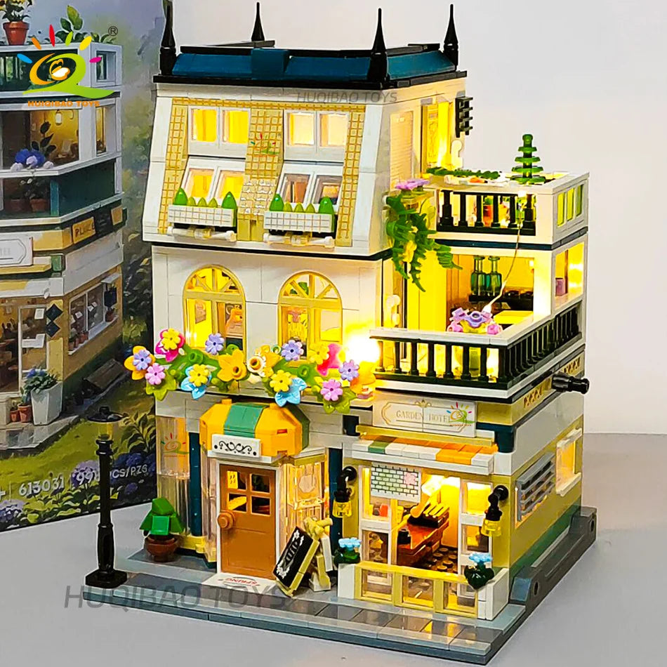 Detailed model of a building with illuminated windows and decorative elements on a white background